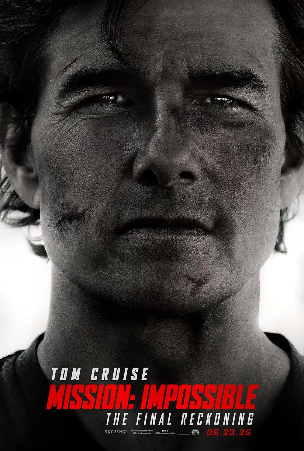 A close-up of a mans face with dirt and scratches, looking serious. Bold red and white text reads: Tom Cruise Mission: Impossible The Final Reckoning 05.23.25 at the bottom of the poster.